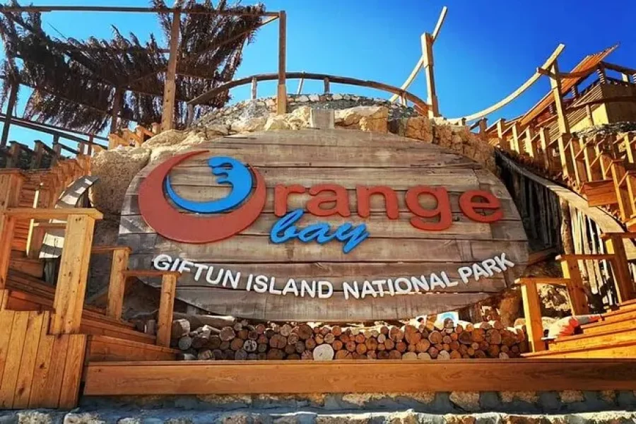 Luxury VIP yacht cruise with snorkeling stops and island visit on **Orange VIP Hurghada featuring Red Sea coral reefs and tropical waters