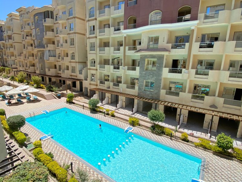 Studio with pool view at Florenza Khamsin Hurghada featuring 1 big bed and balcony overlooking the swimming pool