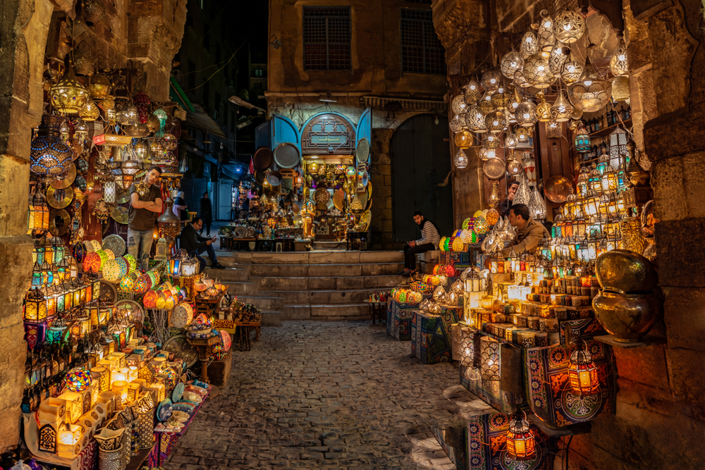 Khan El Khalili bazaar in Cairo with traditional shops, lanterns, and historic Islamic architecture