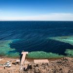 Dahab’s Blue Hole in Egypt with crystal-clear waters and vibrant marine life, popular for diving and snorkeling