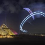 Night paramotoring over the Pyramids of Giza under the stars