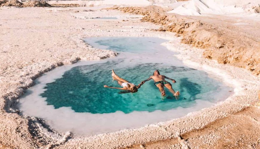 Siwa Oasis in Egypt showcasing palm trees, salt lakes, and desert landscapes