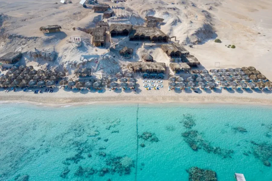 Mahmya Island Hurghada – Guests snorkeling among colorful coral reefs in the Red Sea