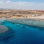 Stunning view of Marsa Alam beach with crystal-clear Red Sea waters and coral reefs