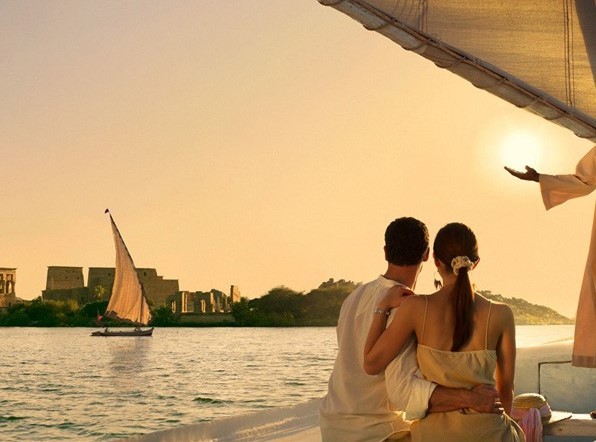 Romantic sunset over a beach for honeymoon ideas