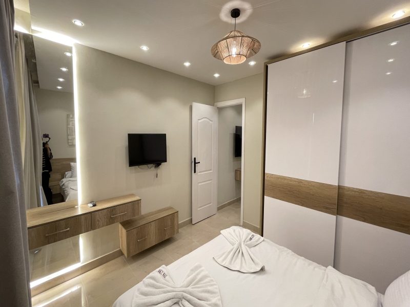 One-bedroom apartment with pool view at Al Karma Beach Resort & Aqua Park Hurghada overlooking resort pools