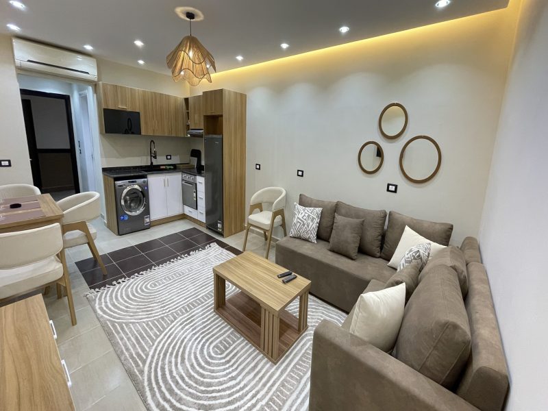 One-bedroom apartment with pool view at Al Karma Beach Resort & Aqua Park Hurghada overlooking resort pools