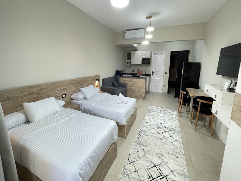 Studio with pool view at Al Karma Beach Resort & Aqua Park Hurghada overlooking swimming pools