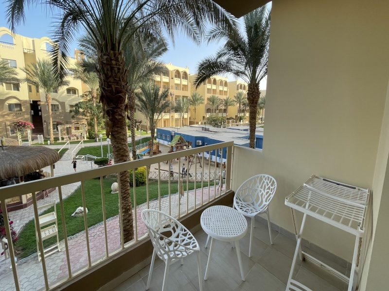 Studio with pool view at Al Karma Beach Resort & Aqua Park Hurghada overlooking swimming pools