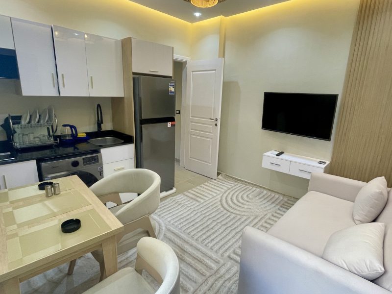 One-bedroom apartment with pool view at Al Karma Beach Resort & Aqua Park Hurghada overlooking resort pools