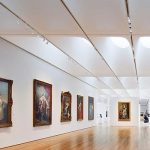 Museums showcasing cultural heritage exhibits, historical artifacts, and interactive visitor experiences in modern exhibition halls