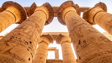 Ancient Egyptian columns at Karnak Temple in Luxor, Egypt