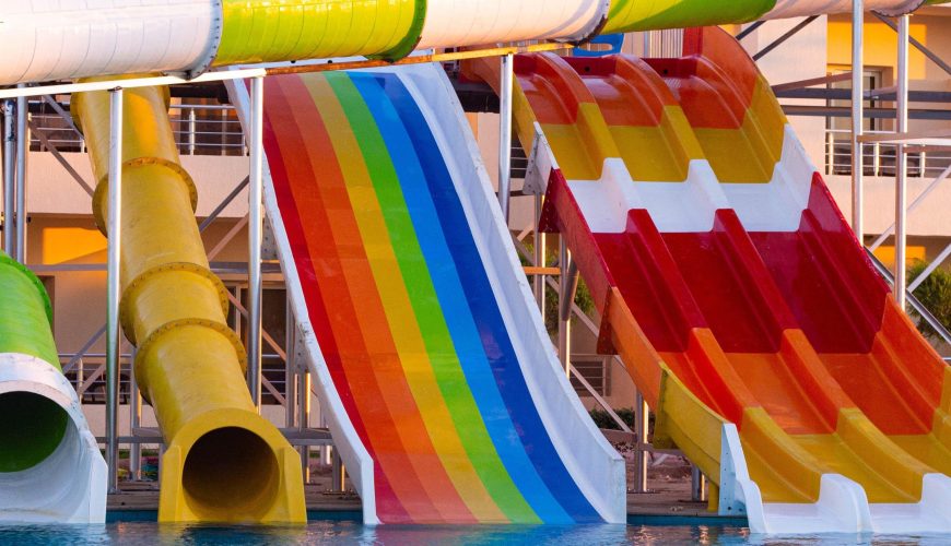Water slides at New Eagles Aqua Park in Hurghada, Egypt, with water activities for visitors.