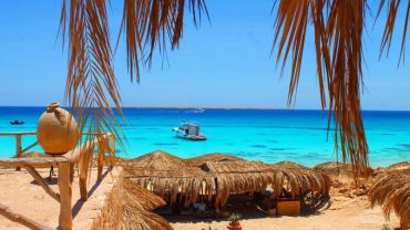 Comparison of Orange Bay and Mahmeya Island with turquoise Red Sea water and sandy beaches near Hurghada