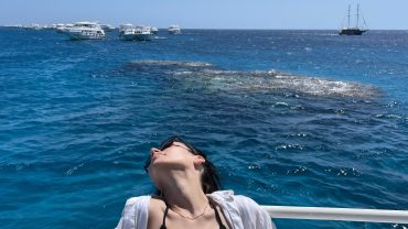 Private boat trip in the Maldives with turquoise lagoon waters, island scenery, and snorkeling opportunities.