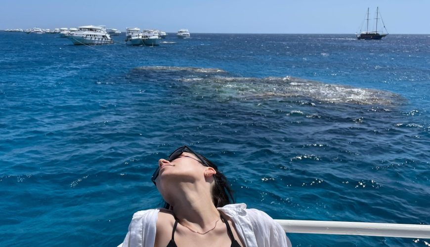 Private boat trip in the Maldives with turquoise lagoon waters, island scenery, and snorkeling opportunities.