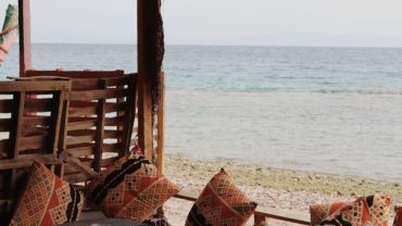 Tourists enjoying a boat trip across the Red Sea from Hurghada to New Amwaj, Magawish, and Maldives Islands.